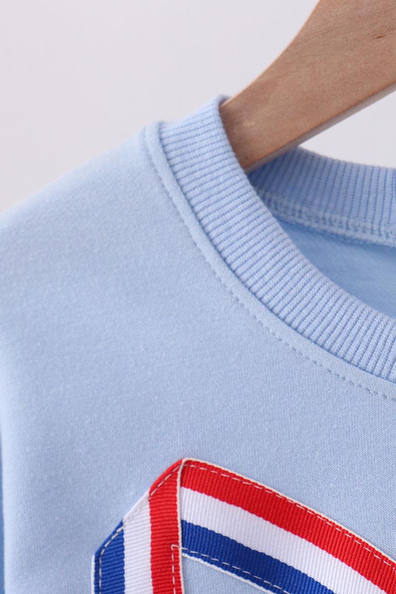 Sudadera azul hecha a mano con lazo para mamá y yo