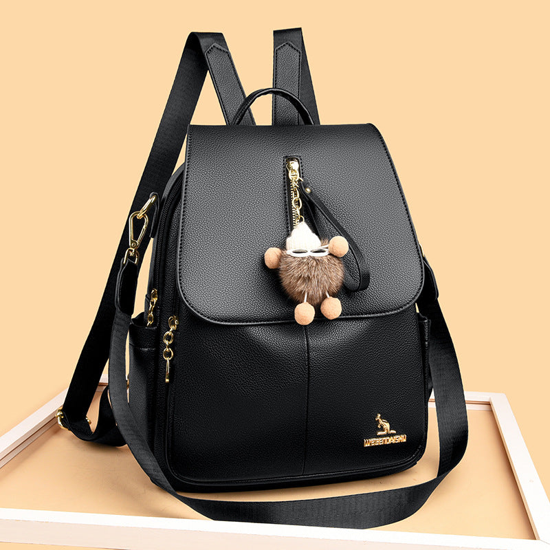 Mochila de viaje de piel auténtica con colgante de alto valor para estudiantes