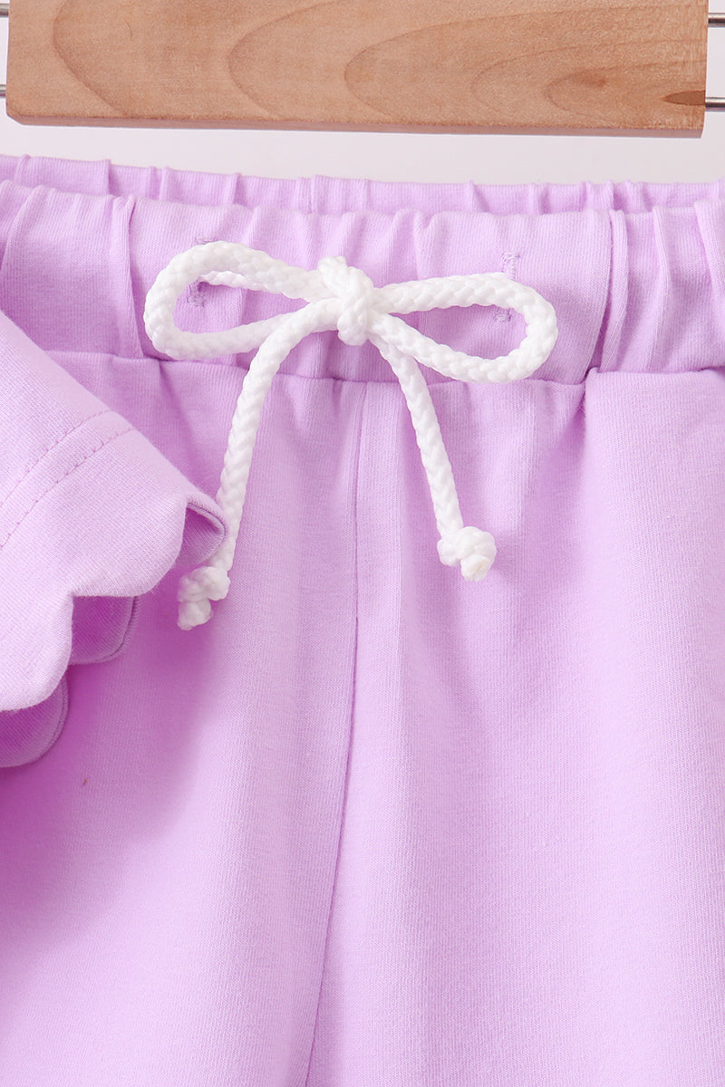 Conjunto de shorts con volantes morados