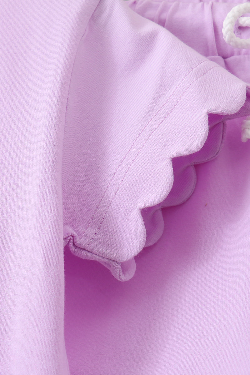 Conjunto de shorts con volantes morados