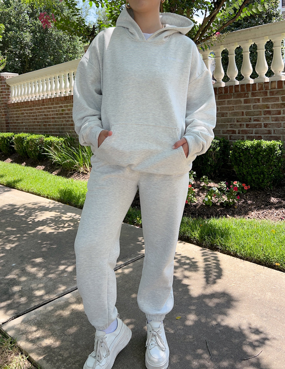 Sudadera unisex con capucha básica gris nube