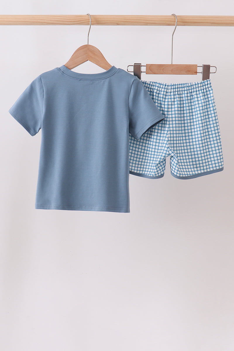 Conjunto de pantalón corto y blusa de bolsillo a cuadros azul
