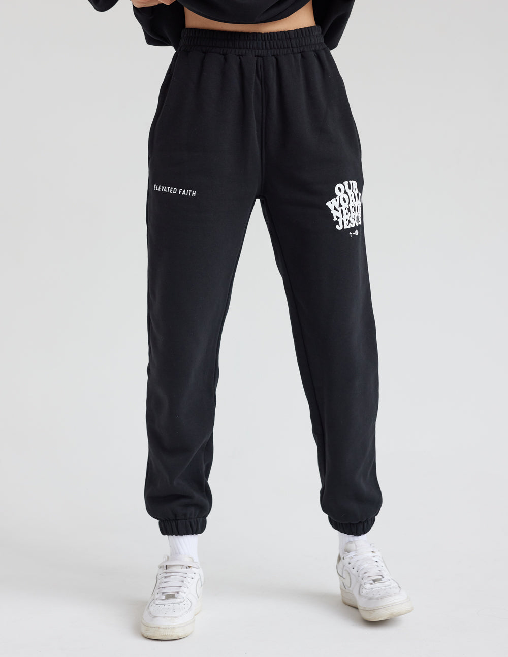 Nuestro mundo necesita el pantalón de chándal unisex negro de Jesús