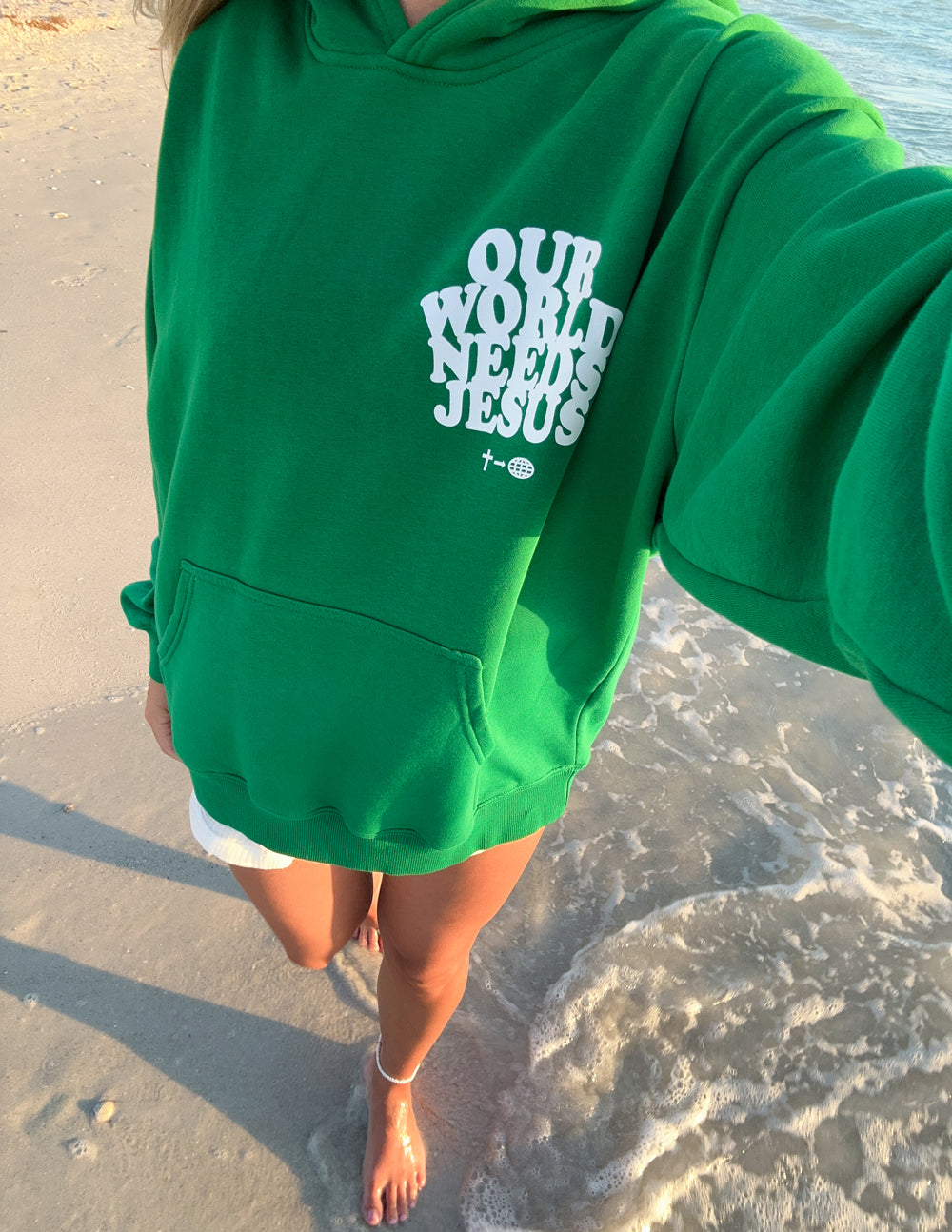 Nuestro mundo necesita a Jesús Sudadera con capucha unisex