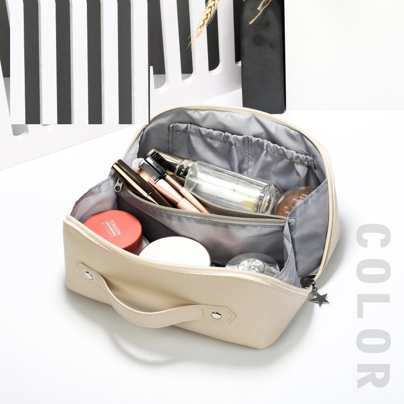 Bolsa de almacenamiento de cosméticos tipo concha de cuero, portátil, para limpieza y viaje