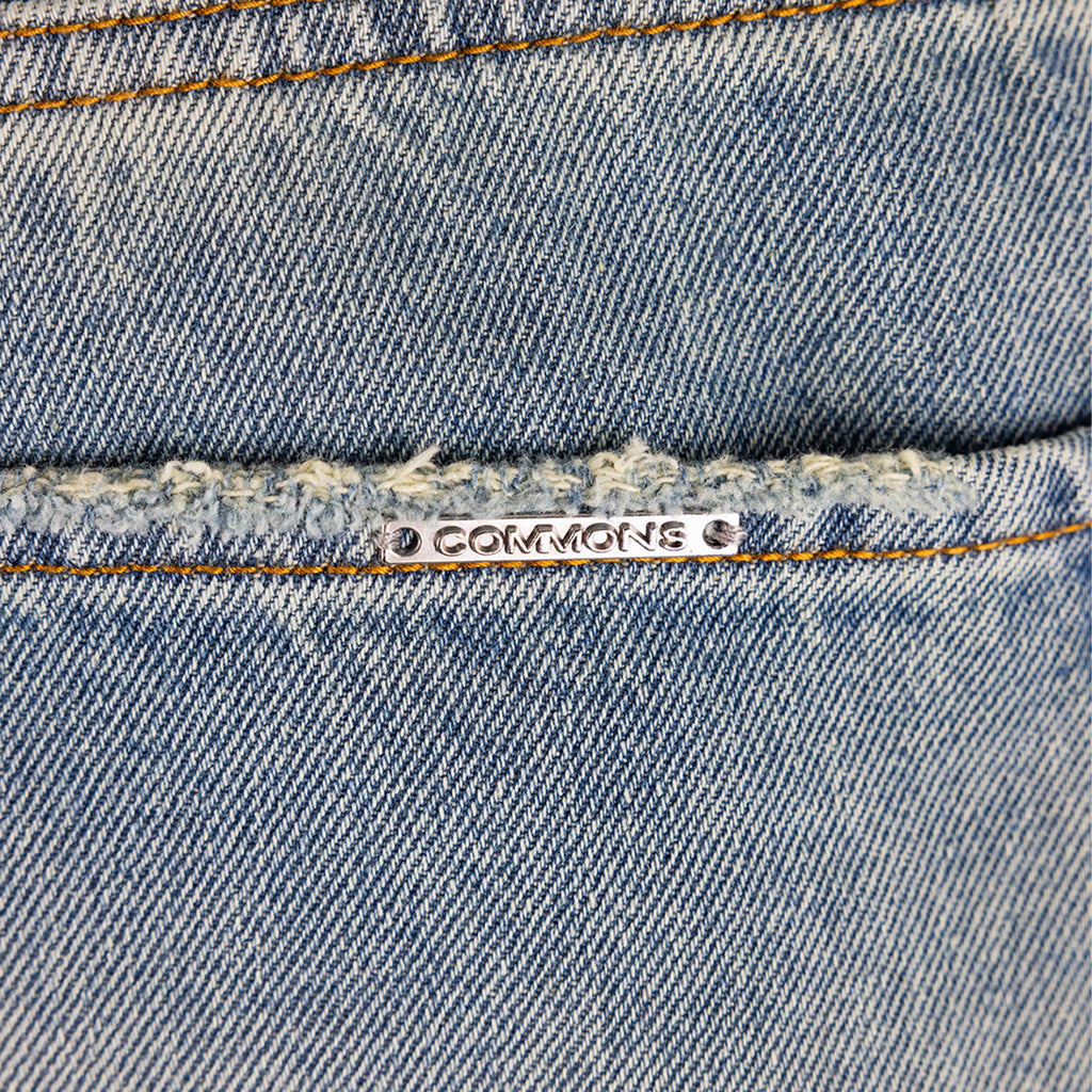 Pantalón de mezclilla recto lavado Commons Studios Jade